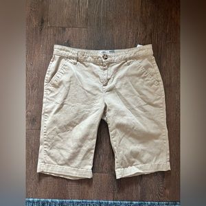 Size 16 girls Old Navy khaki Bermuda shorts. Stretchable and extendable. Uniform